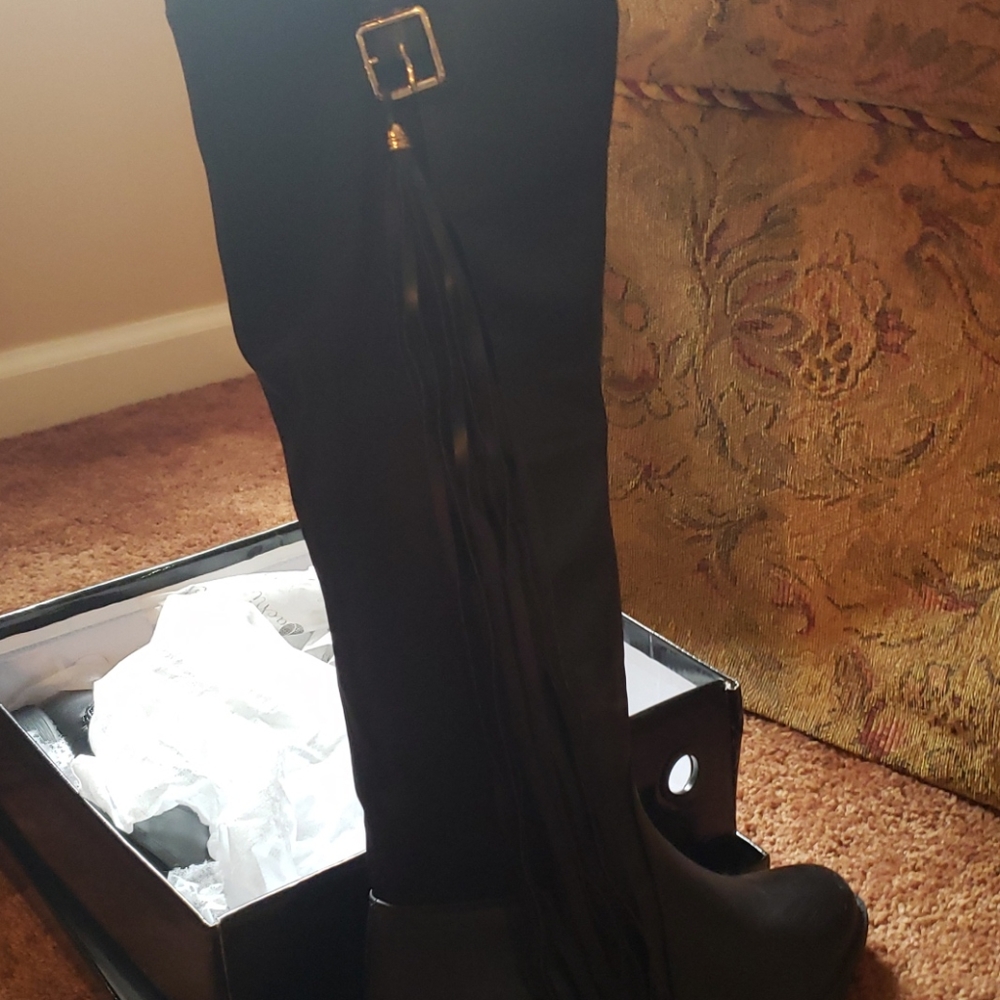 Black knee high leather boots